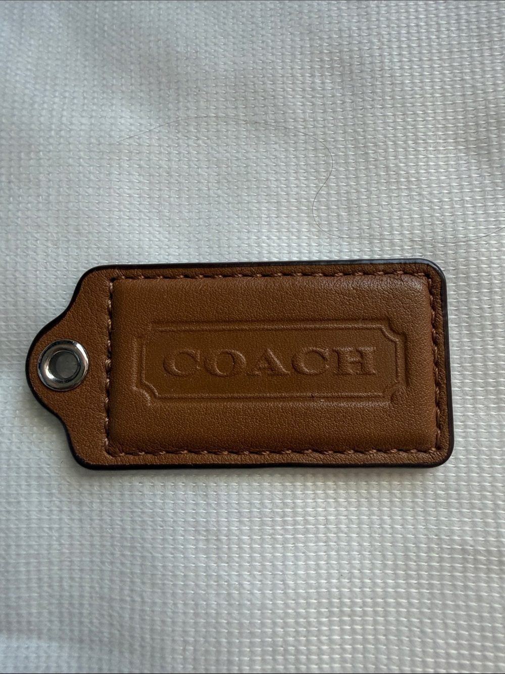 Coach Brown Embossed Leather Hang Tag
